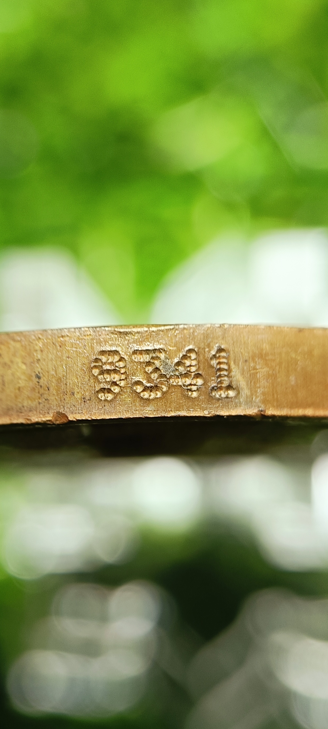 เหรียญพระพิฆเนศ ปางประทานพร สร้างโดยหุ่นละครเล็กโจหลุยส์ ปี 2551