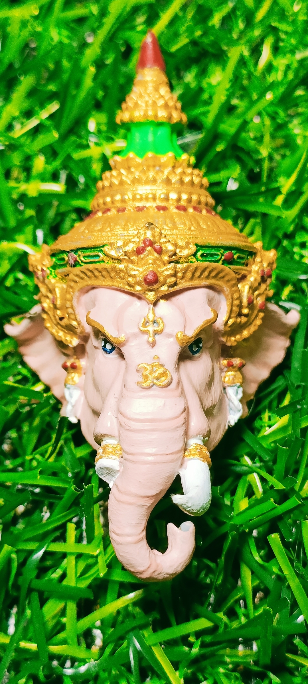 เศียรพระพิฆเนศ หลวงพ่อพัฒน์ วัดห้วยด้วน รุ่น รวยประทานพร ปี 2565 ขนาดสูง 4.8 ซ.ม. กว้าง 2.7 ซ.ม. ลงยาเพ้นสีชมพู