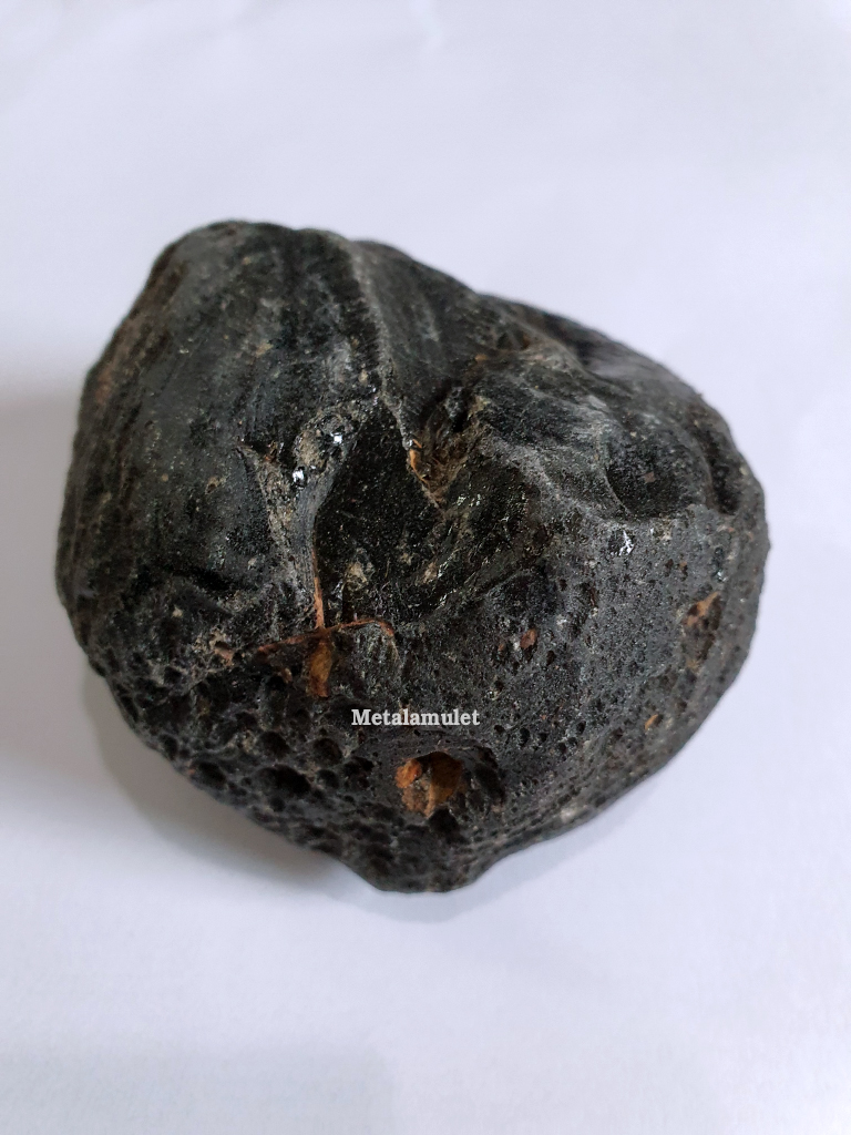 สะเก็ดดาวเมืองนองจากประเทศลาว ( Muong Nong Tektite )