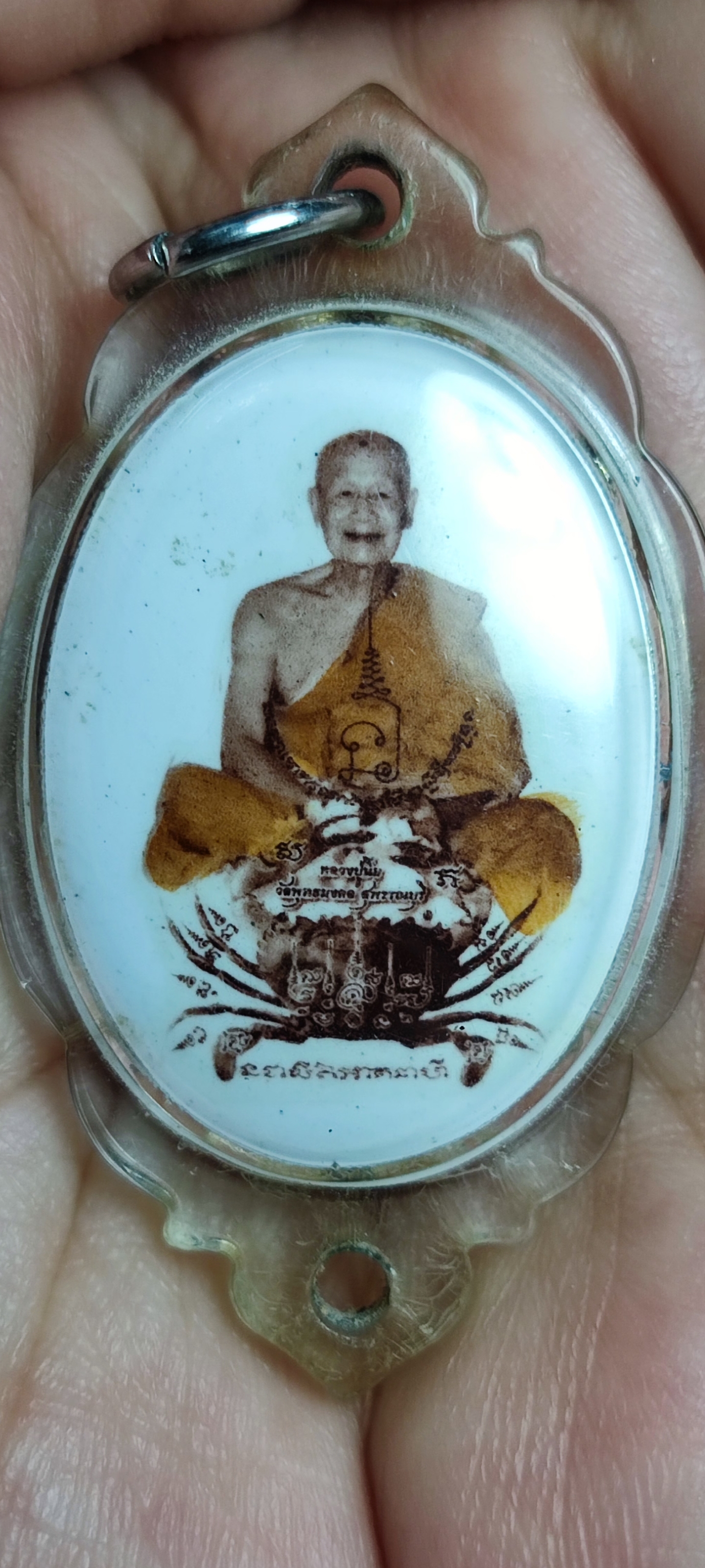 ล็อกเก็ตจินดามณี ปูหนีบทรัพย์ อุดเกศา ก้นยาฉุน รุ่นแรก หลวงปู่นิ่ม วัดพุทธมงคล จ.สุพรรณบุรี