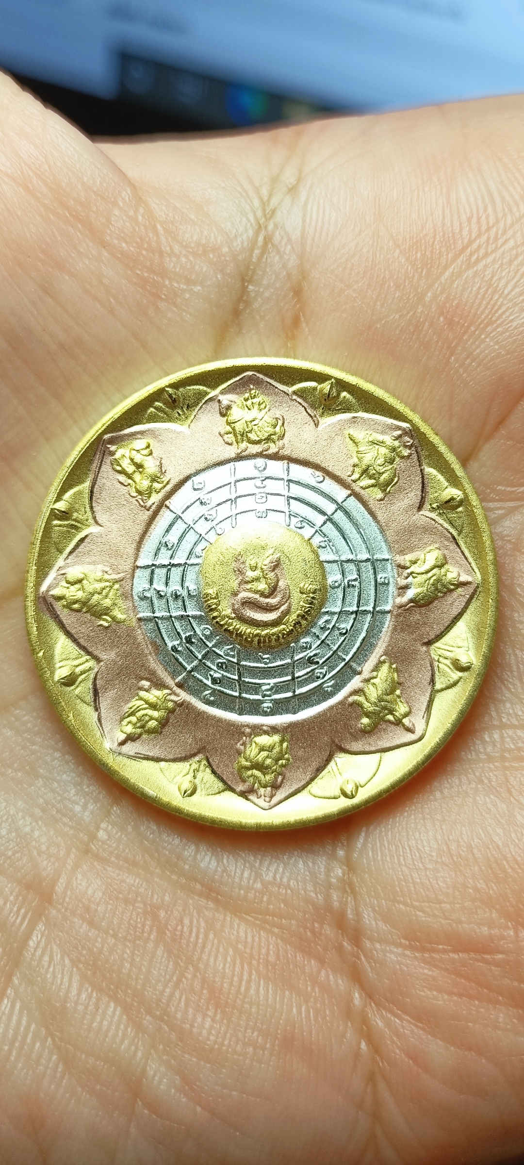 เหรียญจตุคามรามเทพ สถาบันพยากรณ์ศาสตร์ หลังเทวดาพระอาทิตย์ ขนาด 3.2 ซ.ม.