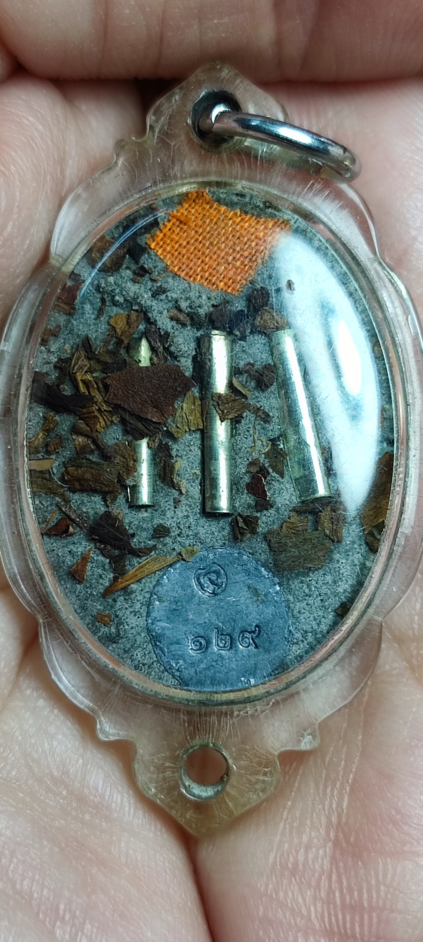 ล็อกเก็ตจินดามณี ปูหนีบทรัพย์ อุดเกศา ก้นยาฉุน รุ่นแรก หลวงปู่นิ่ม วัดพุทธมงคล จ.สุพรรณบุรี