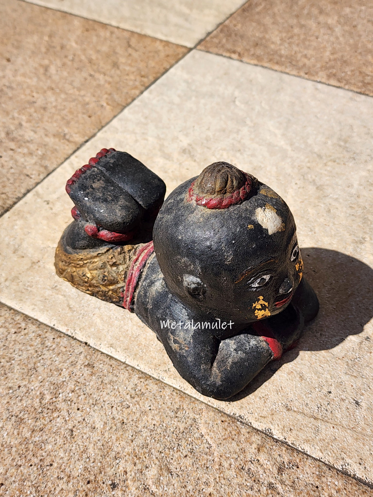 กุมารทองนอนดำ