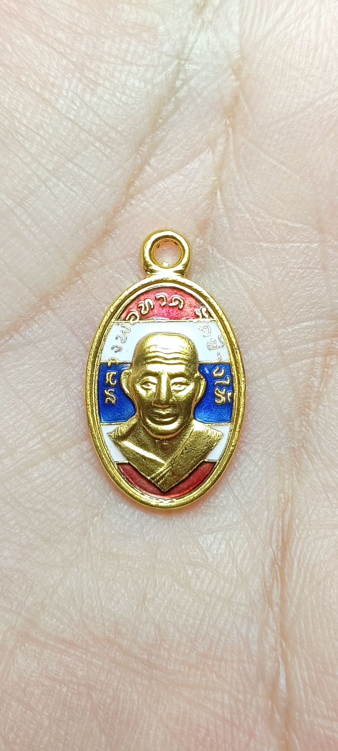 เหรียญหลวงปู่ทวด อาจารย์ทิม รุ่น ๑๐๒ ปี พิมพ์เม็ดแตงใบขี้เหล็ก เนื้อทองแดงนอกลงยาสีธงชาติชุบทอง