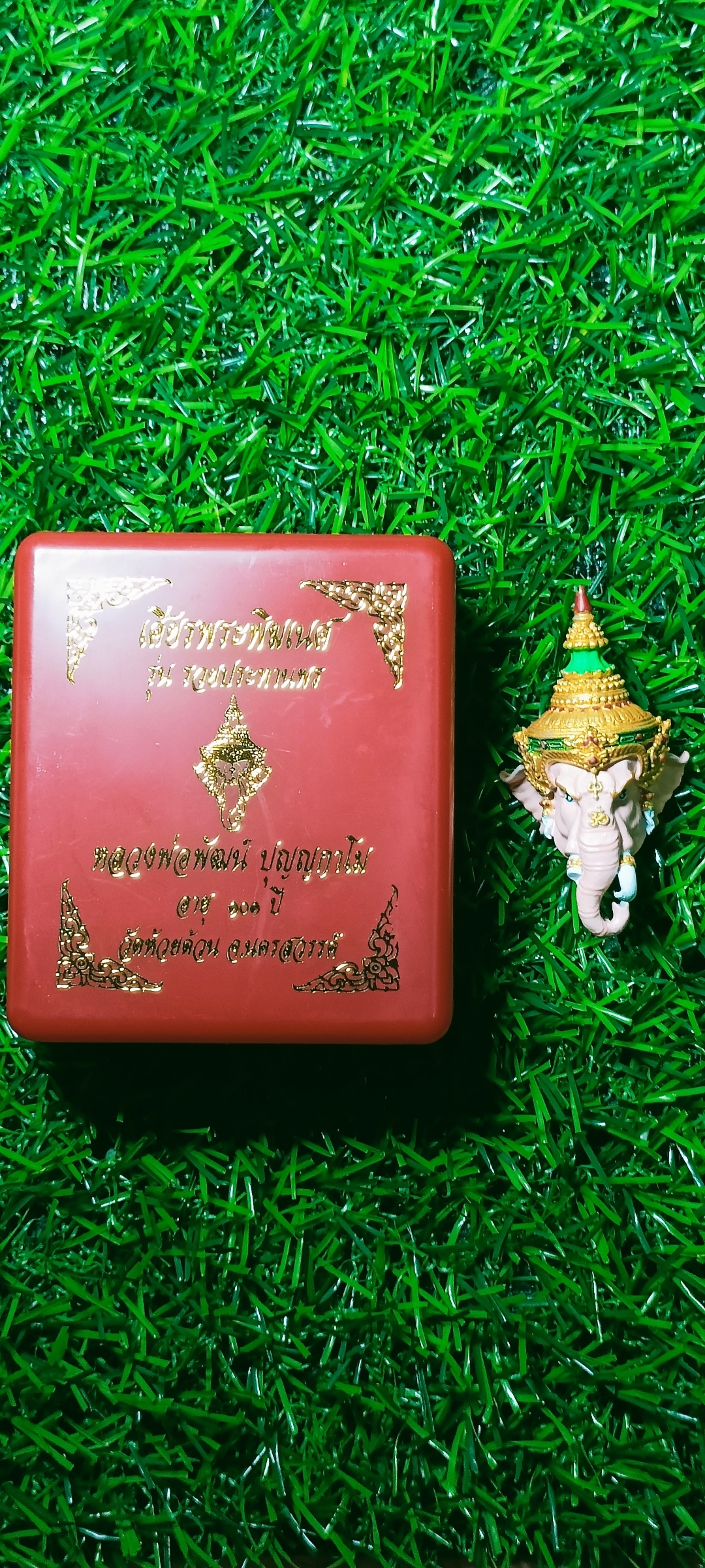 เศียรพระพิฆเนศ หลวงพ่อพัฒน์ วัดห้วยด้วน รุ่น รวยประทานพร ปี 2565 ขนาดสูง 4.8 ซ.ม. กว้าง 2.7 ซ.ม. ลงยาเพ้นสีชมพู