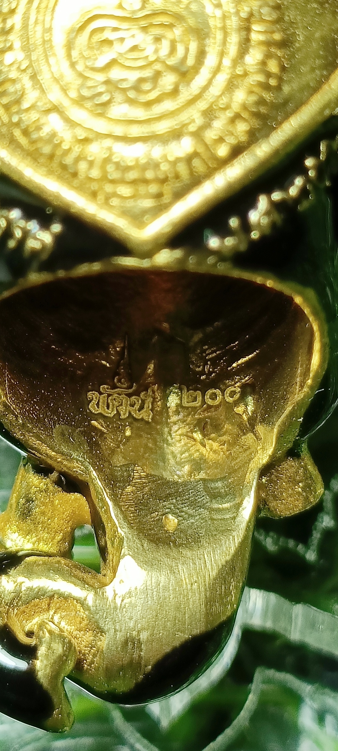 เศียรพระพิฆเณศประทานพร หลวงพ่อพัฒน์ วัดห้วยด้วน ปี 2565 เนื้อทองทิพย์ลงยาดำ หมายเลข๒๐๐