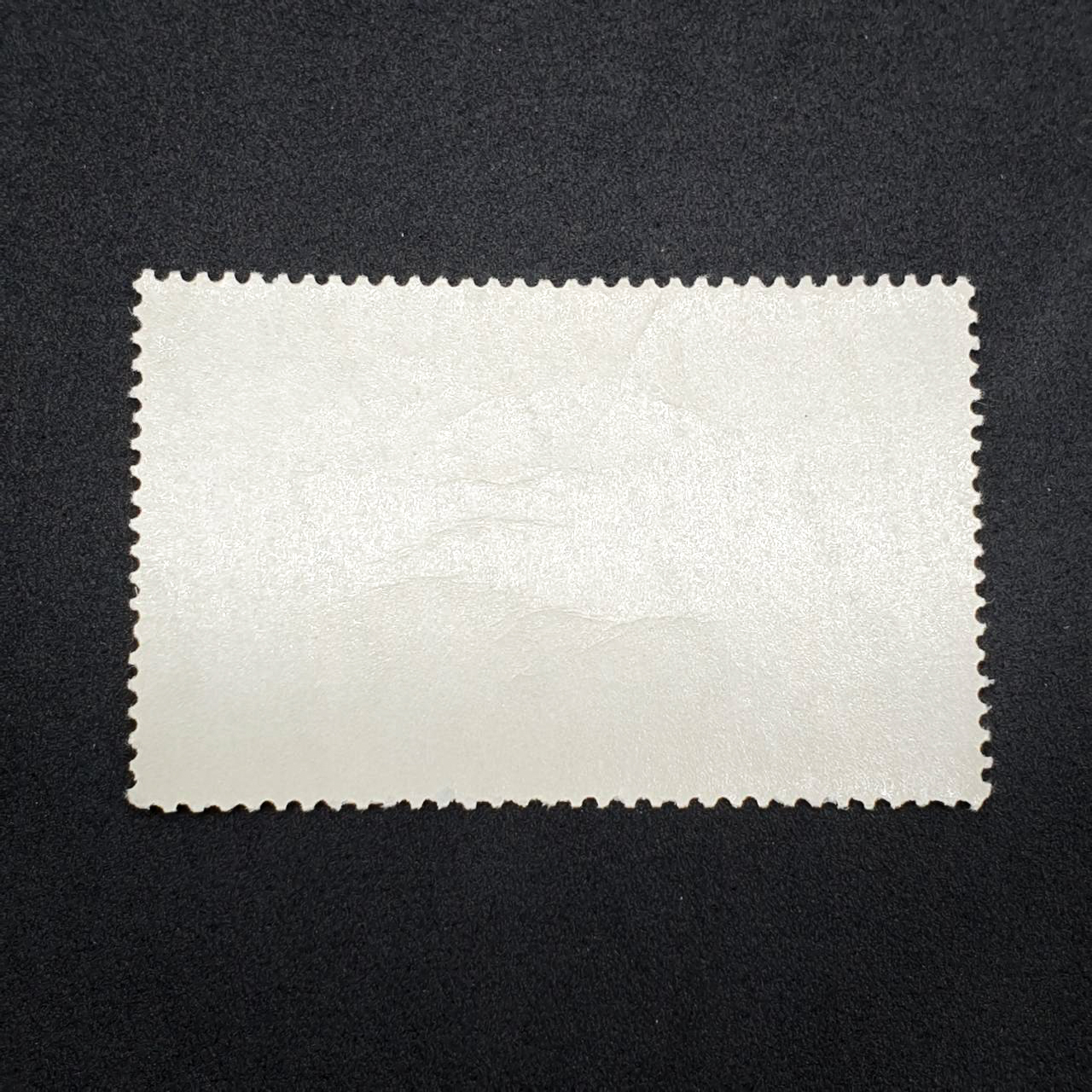 แสตมป์สหภาพโทรคมนาคมระหว่างประเทศ ครบ 100 ปี (สภาพนอก) กาวแตก