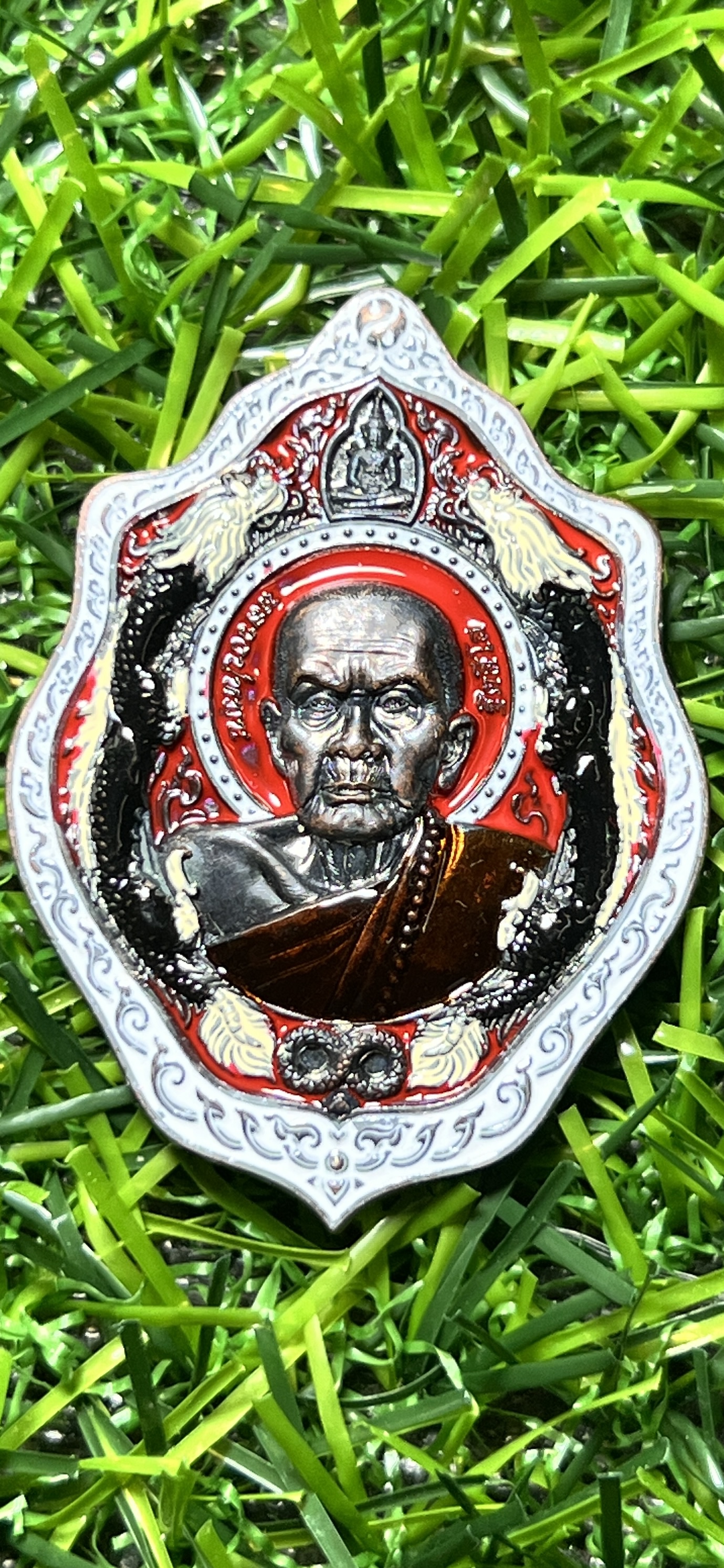 นวะหน้ากากเงินลงยาแดง