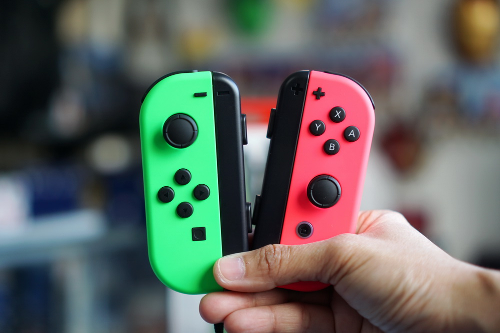 Nintendo Switch Joy-Con Controllers (green and pink)