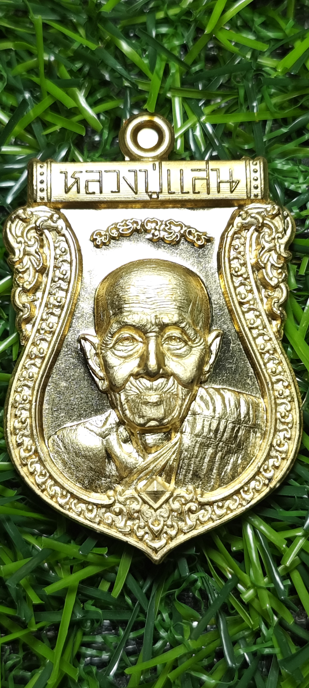 เหรียญเสมาชินบัญชร รุ่นแรก หลวงปู่แสน วัดบ้านหนองจิก จ.ศรีสะเกษ เนื้อทองเทวา