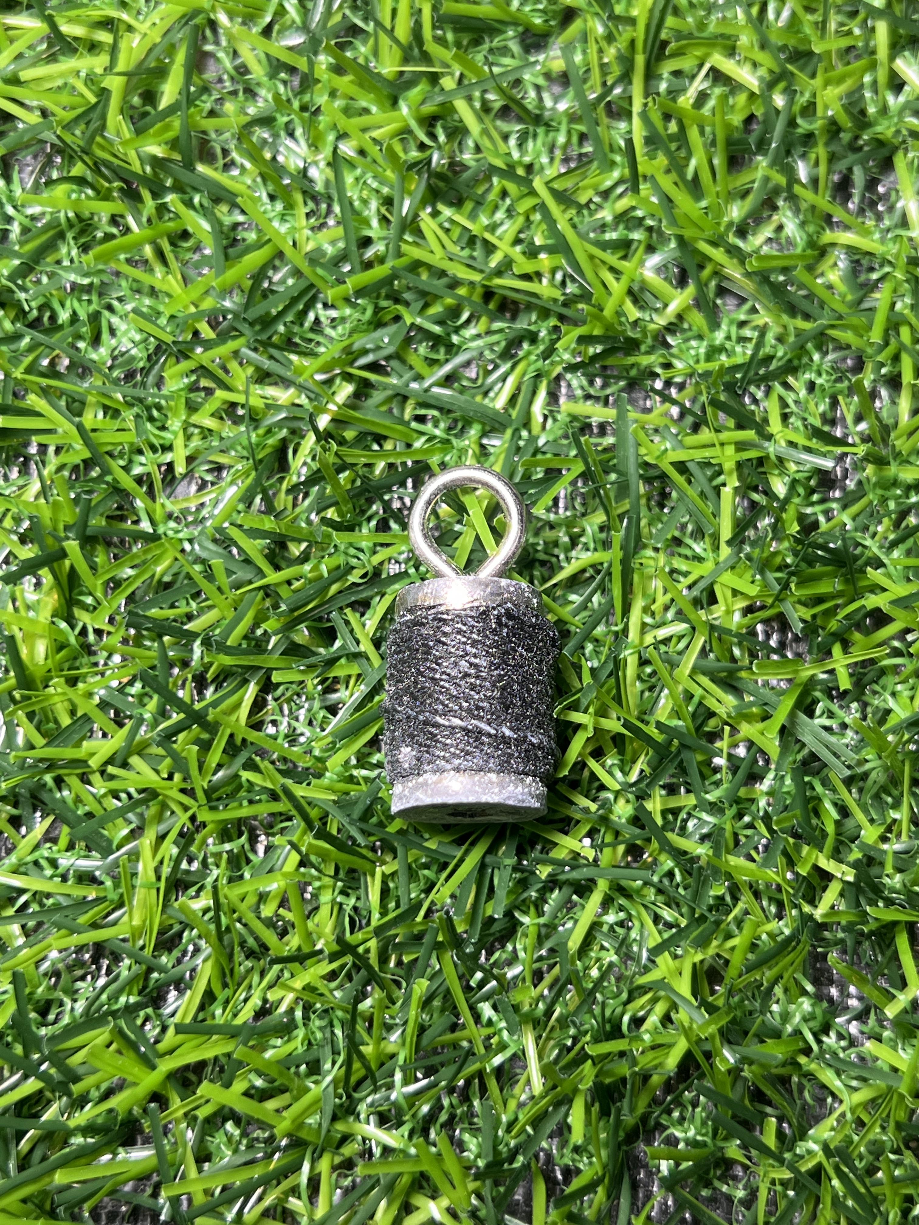 ตะกรุด ทุ่นเบ็ด เนื้อตะกั่ว 1.5ซม. ญาท่านเขียน สำนักสงฆ์ป่าช้าบ้านโพนสิม ตำบลยางขี้นก อำเภอเขื่องใน จังหวัดอุบลราชธานี