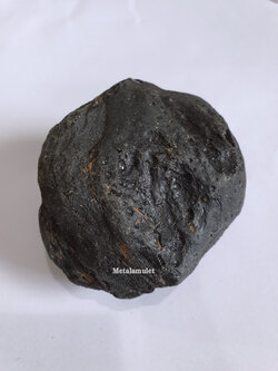 สะเก็ดดาวเมืองนองจากประเทศลาว ( Muong Nong Tektite )