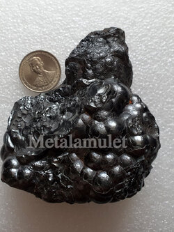 เหล็กไหลงอก ( แร่เกาะล้าน )